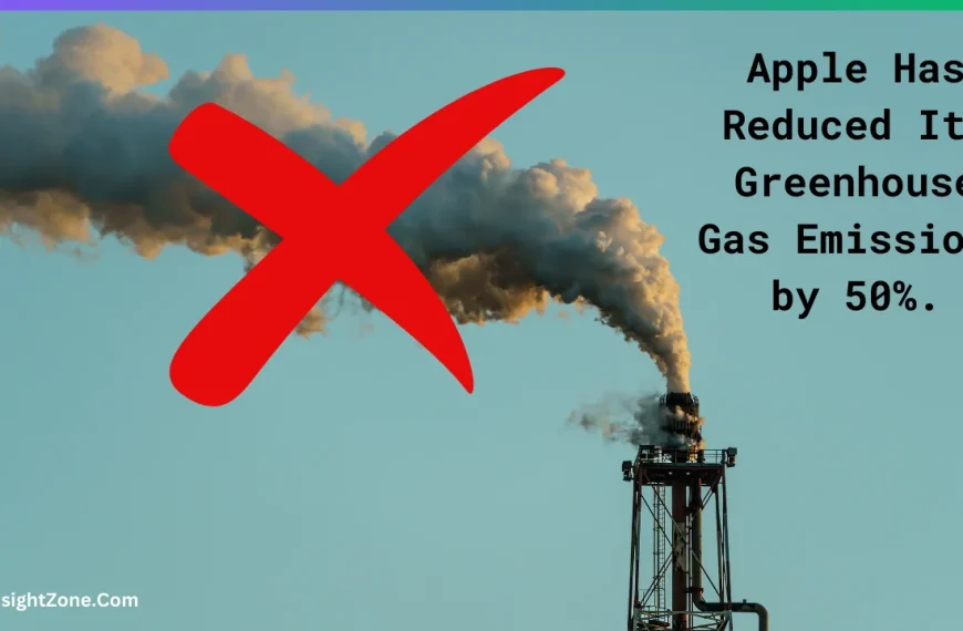 Apple cuts emissions in half