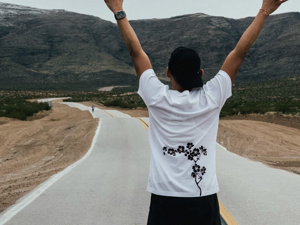 Runner cheering big Wearing Apple Watch